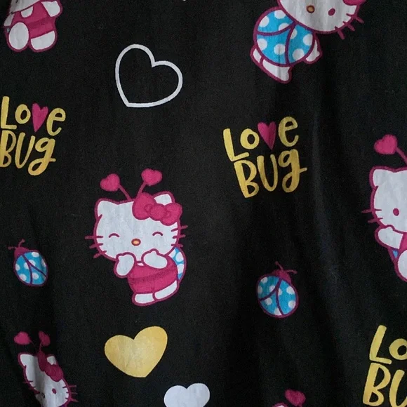 Sanrio Hello Kitty Women’s Scrub Top, Black & Multicolored w/ Pockets, Large SS - Picture 4 of 7